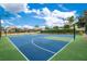 Outdoor basketball court with lights at 2300 Silver Palm Dr # 303, Kissimmee, FL 34747