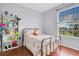 Bright bedroom with a double bed and built-in shelving at 2300 Silver Palm Dr # 303, Kissimmee, FL 34747
