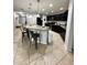Open concept kitchen with breakfast bar and ample counter space at 4738 Blue Diamond St, Kissimmee, FL 34746