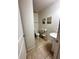 Small bathroom with toilet and sink at 4738 Blue Diamond St, Kissimmee, FL 34746