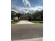 One-story home with two-car garage and mature landscaping at 4738 Blue Diamond St, Kissimmee, FL 34746