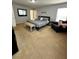 Main bedroom with king-size bed and sitting area at 4738 Blue Diamond St, Kissimmee, FL 34746