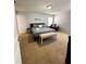 Spacious primary bedroom with plush carpet and ample natural light at 4738 Blue Diamond St, Kissimmee, FL 34746