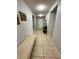 Bright hallway with tile flooring and neutral walls at 4738 Blue Diamond St, Kissimmee, FL 34746