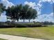 Lakeside Landings community entrance with lush landscaping at 3073 Royal Tern Dr, Winter Haven, FL 33881