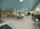 Community pool area with covered seating and tables at 3073 Royal Tern Dr, Winter Haven, FL 33881