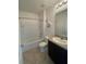 Bathroom with tub, toilet, vanity with granite countertop and mosaic tile at 3073 Royal Tern Dr, Winter Haven, FL 33881