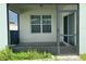 Screened-in porch with concrete flooring and sliding glass door at 3073 Royal Tern Dr, Winter Haven, FL 33881