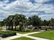 Community playground with playset and picnic tables at 3073 Royal Tern Dr, Winter Haven, FL 33881