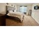 Spacious bedroom with plush carpeting and large windows at 3073 Royal Tern Dr, Winter Haven, FL 33881