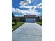 Single-story house with driveway and landscaping at 757 Caribou Dr, Kissimmee, FL 34759