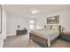 Cozy bedroom with a queen-size bed and neutral color scheme at 356 Toldedo Rd, Davenport, FL 33837