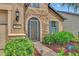 Inviting front entry with stone accents and a screen door at 356 Toldedo Rd, Davenport, FL 33837