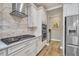 Spacious kitchen featuring stainless steel appliances and granite countertops at 356 Toldedo Rd, Davenport, FL 33837