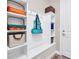 Organized drop zone with built-in shelving and bench at 356 Toldedo Rd, Davenport, FL 33837
