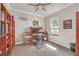 Home office with built-in shelving and hardwood floors at 356 Toldedo Rd, Davenport, FL 33837