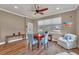 Versatile bonus room with seating and a game table at 356 Toldedo Rd, Davenport, FL 33837