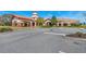 Community clubhouse with inviting landscaping and ample parking at 356 Toldedo Rd, Davenport, FL 33837