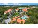 Aerial view of community pool and surrounding buildings at 1301 Tuscan Ter # 9403, Davenport, FL 33896
