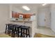 Kitchen with breakfast bar and modern appliances at 1301 Tuscan Ter # 9403, Davenport, FL 33896