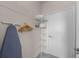 Laundry room with washer, dryer, and shelving at 1301 Tuscan Ter # 9403, Davenport, FL 33896