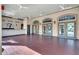 Spacious tiled patio with a built-in bar and French doors at 1301 Tuscan Ter # 9403, Davenport, FL 33896
