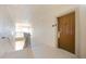 Interior hallway with access to condo unit and stairs at 1301 Tuscan Ter # 9403, Davenport, FL 33896