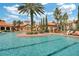 Large swimming pool with plenty of lounge chairs and a relaxing atmosphere at 1301 Tuscan Ter # 9403, Davenport, FL 33896