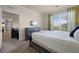 Bedroom with bed and view of living room at 1301 Tuscan Ter # 9403, Davenport, FL 33896