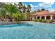 Resort-style pool with cascading waterfall feature at 1301 Tuscan Ter # 9403, Davenport, FL 33896