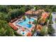 Community pool with surrounding lounge areas at 1301 Tuscan Ter # 9403, Davenport, FL 33896