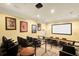 Community theater room with comfortable seating and large screen at 1301 Tuscan Ter # 9403, Davenport, FL 33896