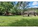Community playground with play structures and shaded picnic area at 1301 Tuscan Ter # 9403, Davenport, FL 33896