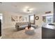 Spacious living room with sectional sofa and a modern coffee table at 8839 Interlocking Ct, Davenport, FL 33896