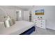 Bright bedroom with a comfortable bed and plenty of natural light at 8839 Interlocking Ct, Davenport, FL 33896
