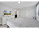 Bedroom with a queen bed and built in TV at 8839 Interlocking Ct, Davenport, FL 33896