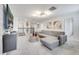 Comfortable living area with a sectional sofa and accent pieces at 8839 Interlocking Ct, Davenport, FL 33896