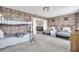 Two twin beds, one bunk bed, and Harry Potter theme at 8839 Interlocking Ct, Davenport, FL 33896
