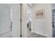 Bright hallway with access to bedrooms and a playful design at 8839 Interlocking Ct, Davenport, FL 33896