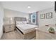 Cozy bedroom with a queen bed, offering a serene atmosphere at 8839 Interlocking Ct, Davenport, FL 33896