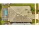 Top-down view of home showing roofline, pool, and spa at 8839 Interlocking Ct, Davenport, FL 33896