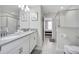 Double vanity, large shower, and modern finishes at 8839 Interlocking Ct, Davenport, FL 33896