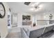 Relaxing living room with sectional sofa and large TV at 8839 Interlocking Ct, Davenport, FL 33896