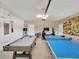 Fun game room with ping pong and pool table at 8839 Interlocking Ct, Davenport, FL 33896