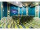 Residential theater with comfy seating and large screen at 8839 Interlocking Ct, Davenport, FL 33896