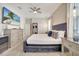 King-size bed, large TV, and plenty of dresser space at 8839 Interlocking Ct, Davenport, FL 33896