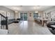 Open floor plan with spacious living and dining areas, perfect for entertaining at 8839 Interlocking Ct, Davenport, FL 33896