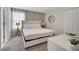 Bedroom with a queen bed and leafy wallpaper at 8839 Interlocking Ct, Davenport, FL 33896