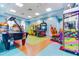 Bright game room with arcade games and air hockey at 8839 Interlocking Ct, Davenport, FL 33896