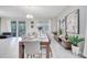 Elegant dining room with a large table and plenty of seating at 8839 Interlocking Ct, Davenport, FL 33896